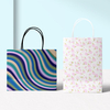 Customized High-Grade Luxury Kraft Paper Bag Reflective Laser Gradient Film Square Bottom Handbag Holiday Packaging Custom Logo
